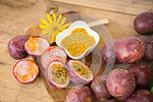 Fresh passion fruits on a wooden background