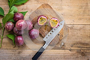 Fresh passion fruits on a wooden background