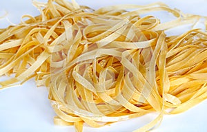Fresh pasta close-up on white table