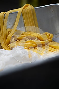 Fresh pasta on kitchen table