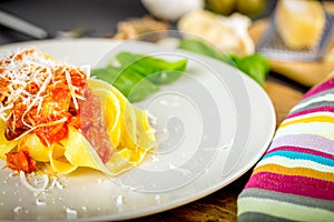 Fresh pasta with tomato sauce.