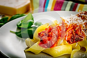 Fresh pasta with tomato sauce.