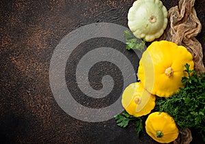 Fresh patissons on old rusty background