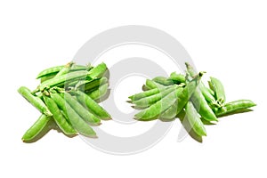 Fresh pea pods isolated on white background