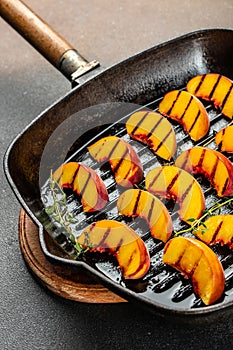 Fresh peaches on grill, Food recipe background. Close up