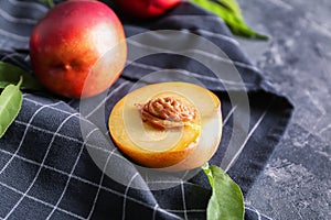 Fresh peaches on napkin, closeup