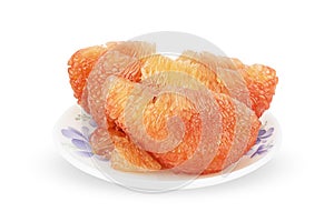 Fresh pealed pomelo on white plate with clipping path