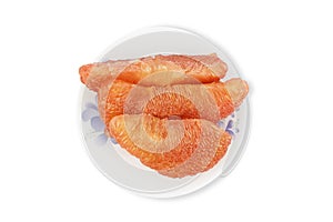 Fresh pealed pomelo on white plate with clipping path, top view