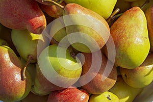 Fresh pears as a background, top view