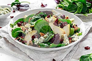 Fresh Pears, Blue Cheese salad with vegetable green mix, walnuts, cranberry. healthy food