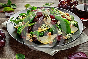 Fresh Pears, Blue Cheese salad with vegetable green mix, Walnuts, red grapes. healthy food