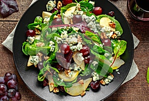Fresh Pears, Blue Cheese salad with vegetable green mix, Walnuts, red grapes. healthy food