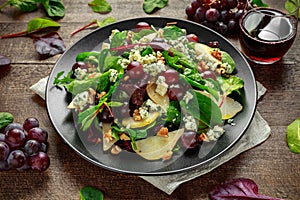 Fresh Pears, Blue Cheese salad with vegetable green mix, Walnuts, red grapes. healthy food