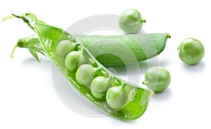 Fresh peas are contained within a pod.