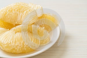 Fresh peeled pomelo, grapefruit or shaddock