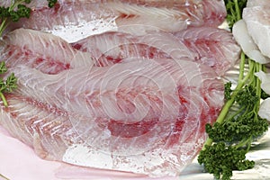 Fresh Perch Fillet and Parsley at Fish Shop