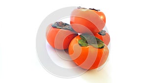 Fresh persimmon on white background