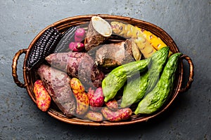 Fresh peruvian Latin American vegetables caigua, sweet potatoes, black corn, camote, yuca