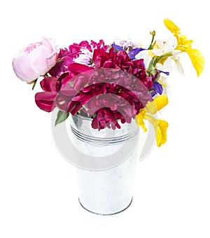 Fresh picked flowers in silver metal bucket