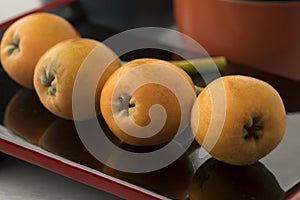 Fresh picked loquats on a Japanese dish