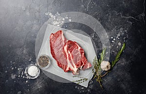 Fresh piece of beef meat on gray background