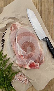 Fresh piece of meat with knife