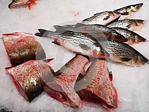 Pieces of cut carp and sea bass