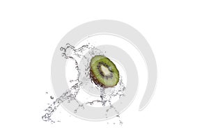 Fresh pieces of kiwi in water splash, isolated on white background