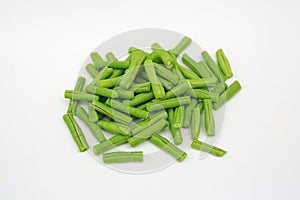 Fresh pile of chopped long beans on white background, ready for cooking