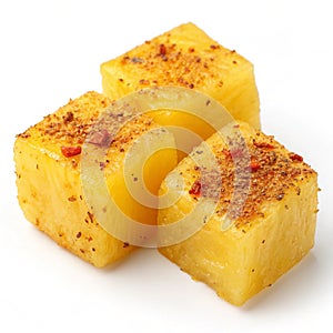 Spiced pineapple cubes isolated on white background photo