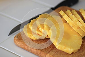 A Fresh Pineapple sliced into rounds