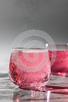 Fresh pink drink with bubbles