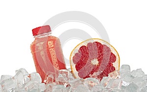 Fresh pink grapefruit juice and cut slice on ice