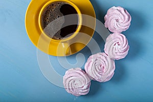 Fresh pink homemade zephyr - marshmallow and cup of coffee