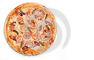 Fresh pizza with sausage, ham, onion, Pickled gherkins and cheese isolated on white background. Copyspace. Top view