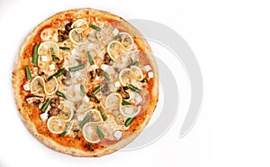 Fresh pizza with seafood mussels, green beans, lemon, cut feta cheese isolated on white background. Copyspace. Top view