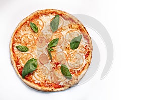 Fresh pizza with tomatoes, cheese and basil isolated on white background. Copyspace. Top view