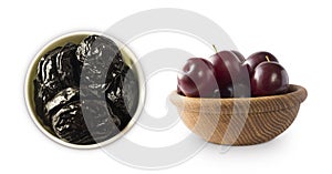 Fresh plums and dried prunes isolated on a white background. Prunes and fresh plum in a bowl on white background. Prunes and fresh