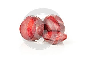 Fresh pluot interspecific plums isolated on white