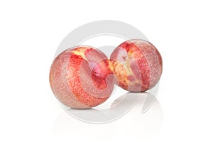 Fresh pluot interspecific plums isolated on white