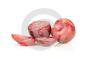 Fresh pluot interspecific plums isolated on white