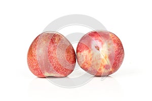 Fresh pluot interspecific plums isolated on white