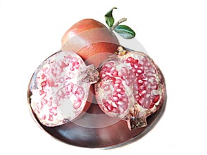 Fresh pomegranate fruit isolated on white background.