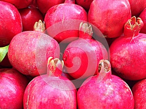 the fresh pomegranates appeared on the juice stand