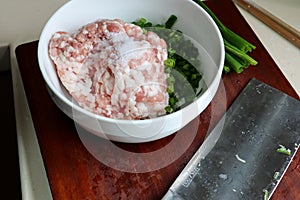 Fresh pork meat with leek in bow