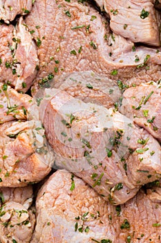 Fresh pork meat pieces in marinade.