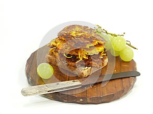 Fresh potatoe pancake on wooden plate