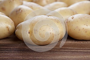 Fresh potatoes on wood V