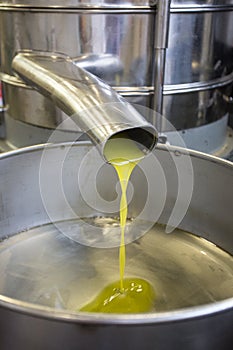 Fresh pressed olives now as the oil in the metal sink