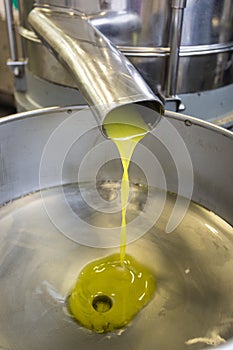 Fresh pressed olives now as the oil in the metal sink